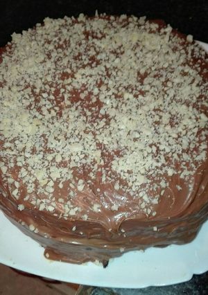 Una foto de Bizcocho de chocolate con crema de queso