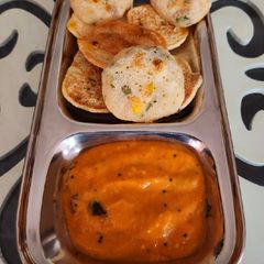 A picture of Corn mini uttapam.