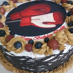 A picture of Chocolate mint cake with chocolate cage.