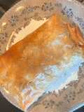 Saquitos de masa filo rellenos de calamares a la americana