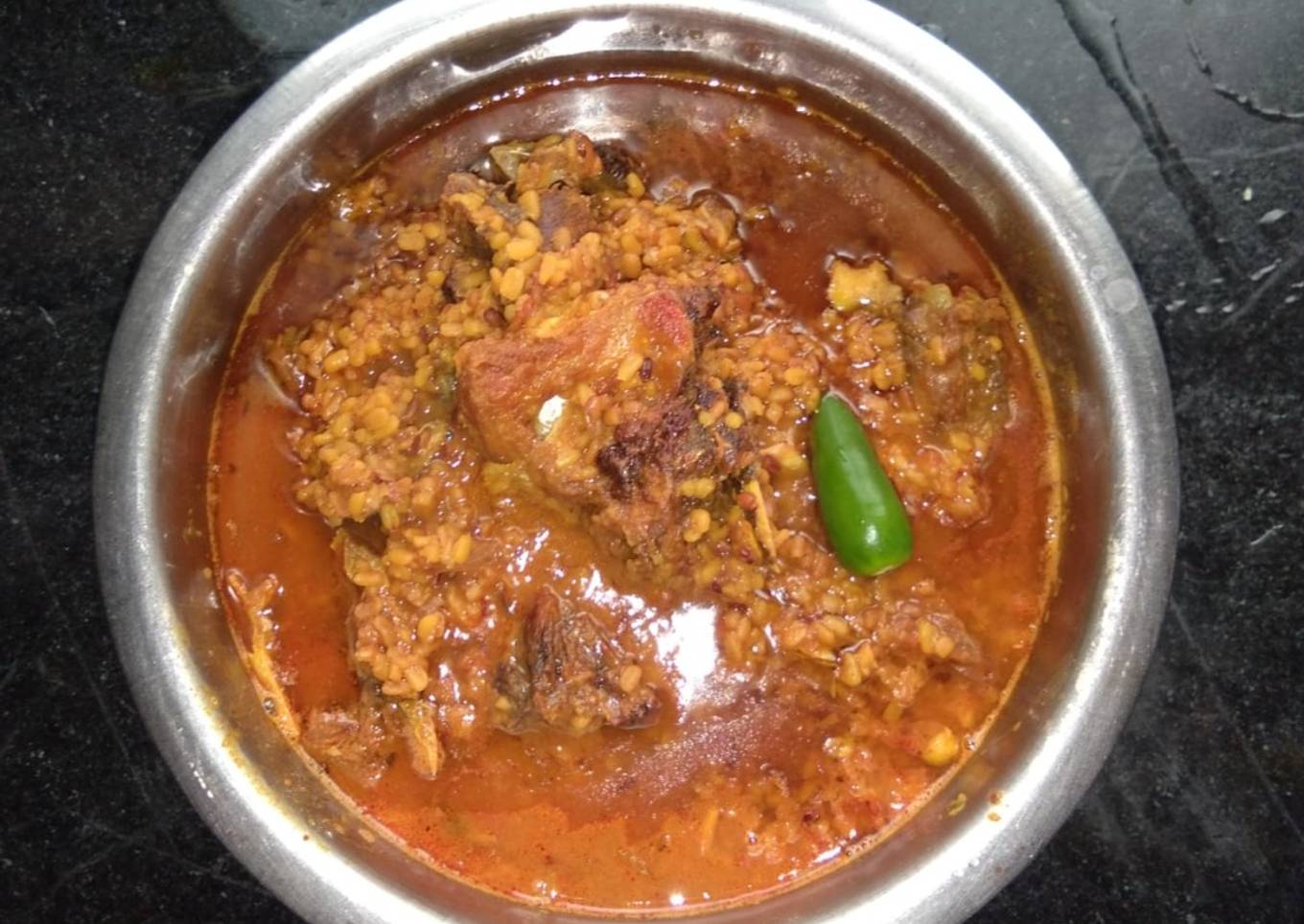 Mung dal with fish head