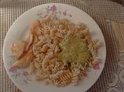 Una foto de tallarines al pesto