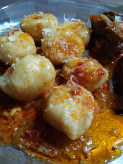 Una foto de Ñoquis rellenos de queso