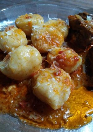 Una foto de Ñoquis rellenos de queso