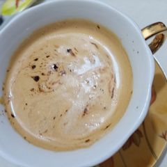 A picture of Frothy Creamy coffee with technique.