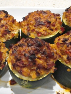 Una foto de Calabacines rellenos de arroz