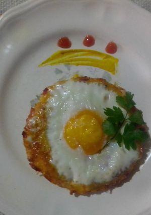 Una foto de Papas con huevito