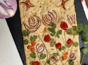 Una foto de focaccia con harina integral