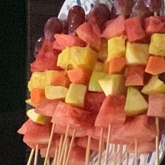 A picture of Fruit kebabs.