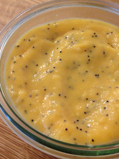 A picture of Lemon Curd with Poppy Seeds.