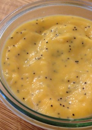A picture of Lemon Curd with Poppy Seeds.