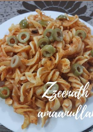 A picture of Red Sauce Pasta with Olives.