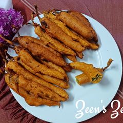 A picture of Mirchi Bhajiye with Gongura Chutney.