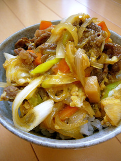 A picture of Easy Sukiyaki-Style Beef Bowl with Scallions.