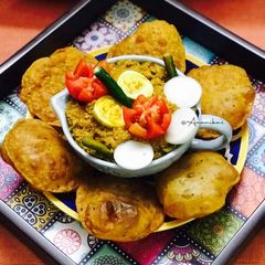 A picture of Dhaba Style: Chicken Keema Masala with Masala Puri.