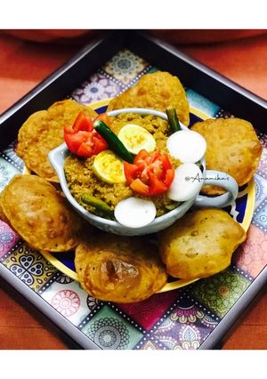 A picture of Dhaba Style: Chicken Keema Masala with Masala Puri.