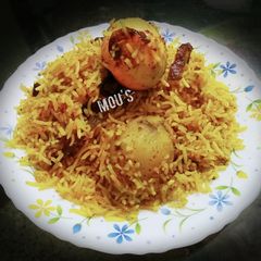 A picture of Hyderabadi egg dum biryani.