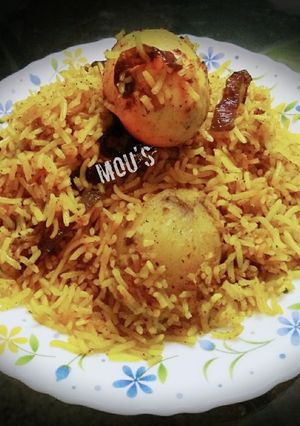 A picture of Hyderabadi egg dum biryani.