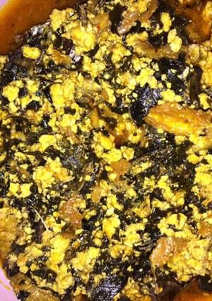 A picture of Egusi with bitterleaf soup.