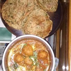 Dum ALU and methi makai puri A picture of Dum ALU and methi makai puri.