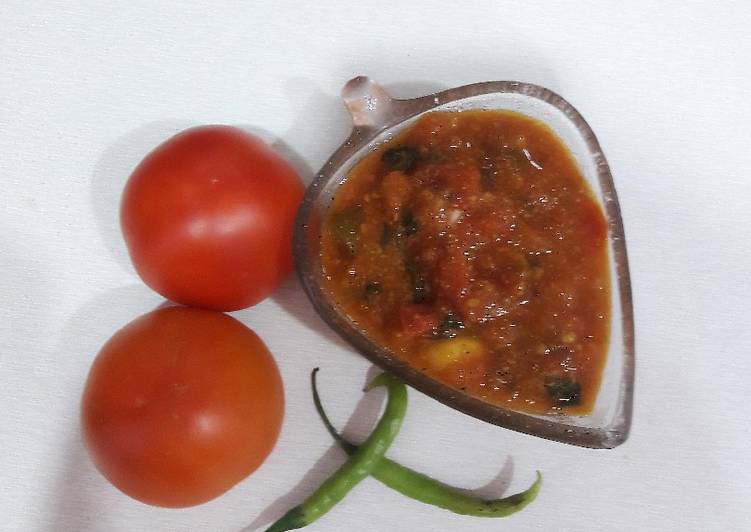 Quick tamatar kalaunji subji (tomato curry)