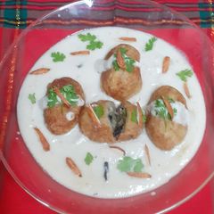 A picture of Farali kofta in white gravy (no onion, no garlic) (Vrat Special).