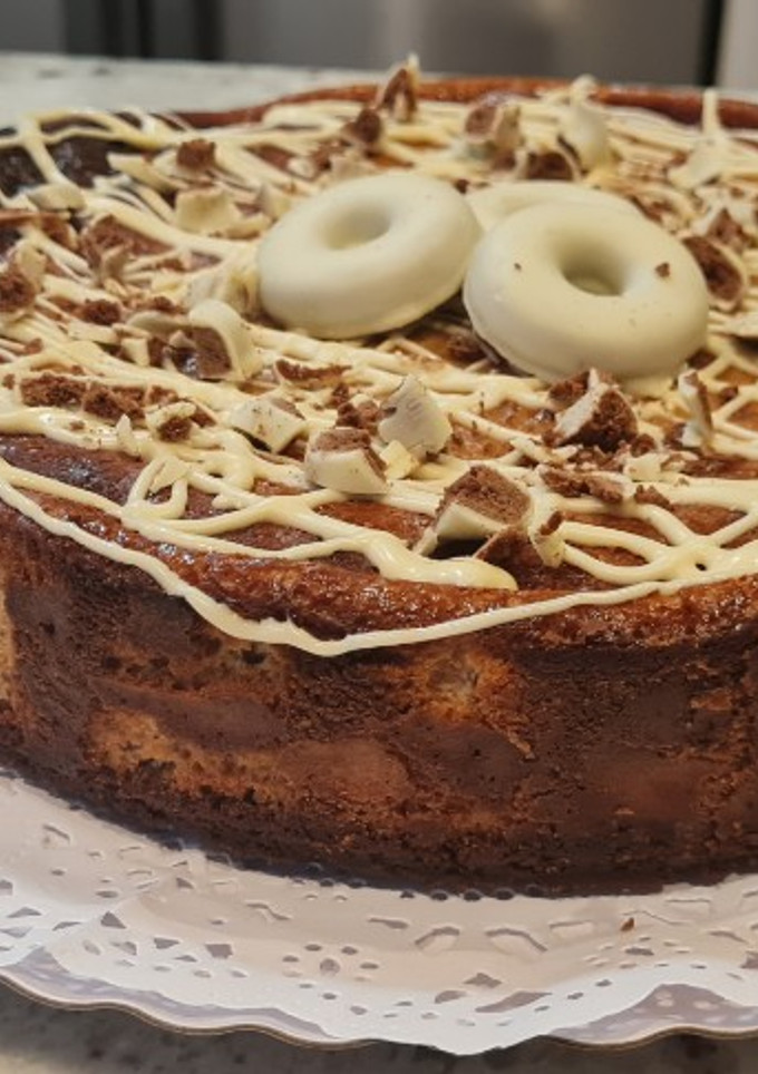 Una foto de Tarta de queso y Filipinos blancos al horno