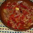 Lacón con pimientos de piquillo con ajo encebollado