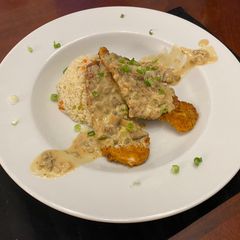 A picture of Pork Medallions in a Mushroom Cream Sauce.