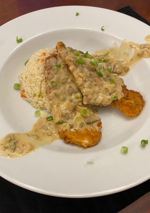 A picture of Pork Medallions in a Mushroom Cream Sauce.