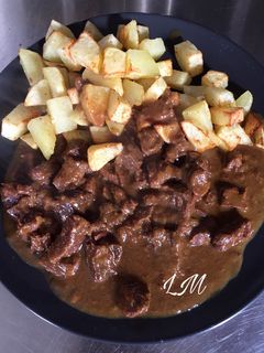 Una foto de Estofado de cerdo con mostaza y Cola-Cola