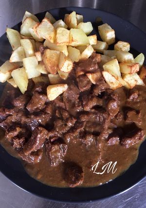 Una foto de Estofado de cerdo con mostaza y Cola-Cola