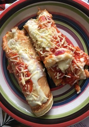 Una foto de Canelones de carne y de pollo