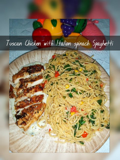 A picture of Tuscan Chicken with White Sauce and Italian Spinach Spaghetti.