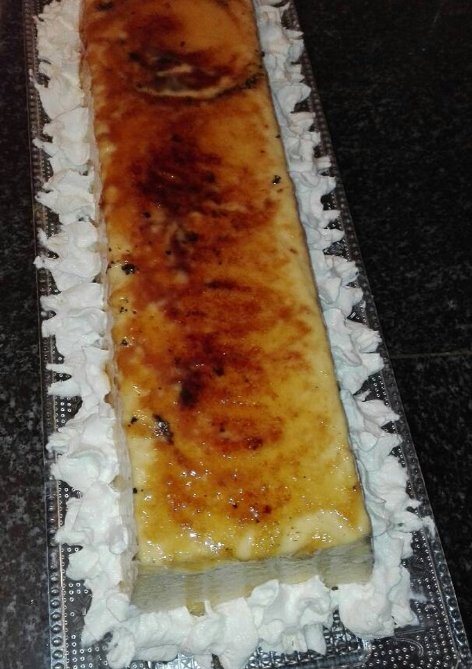 Una foto de Flan de crema catalana y almendras a mi manera