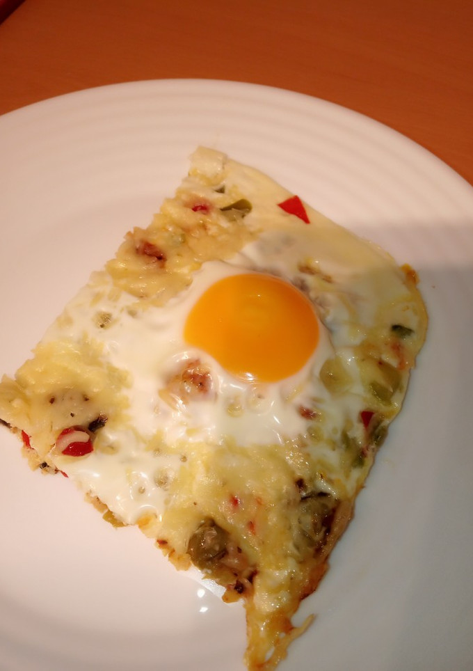 Una foto de Pisto con huevo al horno