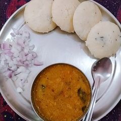 Rava idli with sambar (homemade sambhar masala) A picture of Rava idli with sambar (homemade sambhar masala).