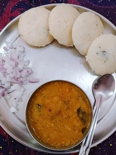 A picture of Rava idli with sambar (homemade sambhar masala).