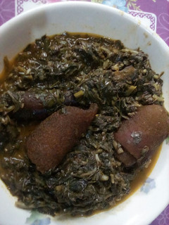 A picture of Water leaf and ugu soup.