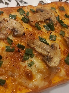 Una foto de Calabaza rellena al horno gratinada 🤤