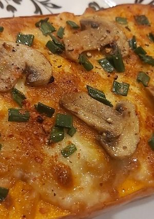 Una foto de Calabaza rellena al horno gratinada 🤤