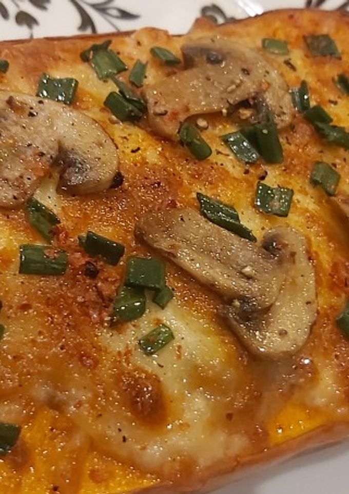 Una foto de Calabaza rellena al horno gratinada 🤤