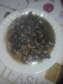 Una foto de Caracoles en salsa