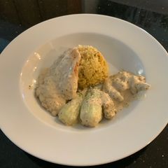 A picture of Creamy Lemon Chicken with Artichokes and Bok Choy.
