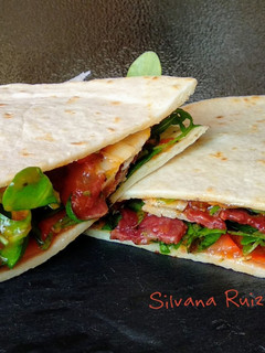 Una foto de 164.🌮Piadina de jamón ibérico y parmesano🍖🧀