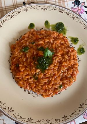 Foto di Risotto al pomodoro con riduzione di basilico 🌿