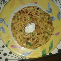A picture of Cheese onion stuff prantha.