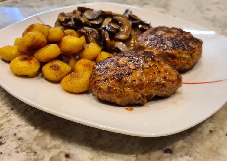 Hamburguesa de chorizo con champiñones al ajillo