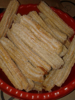 Una foto de Churros rellenos con dulce de leche