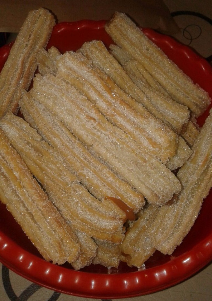 Una foto de Churros rellenos con dulce de leche